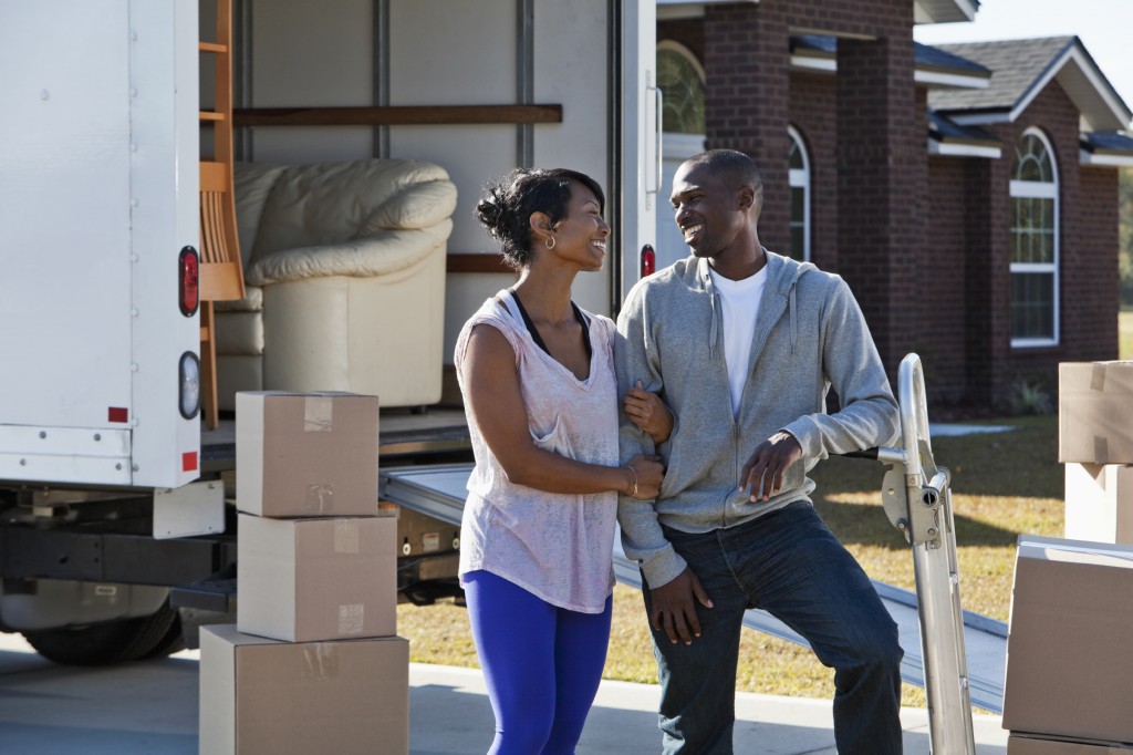 African American couple moving house
